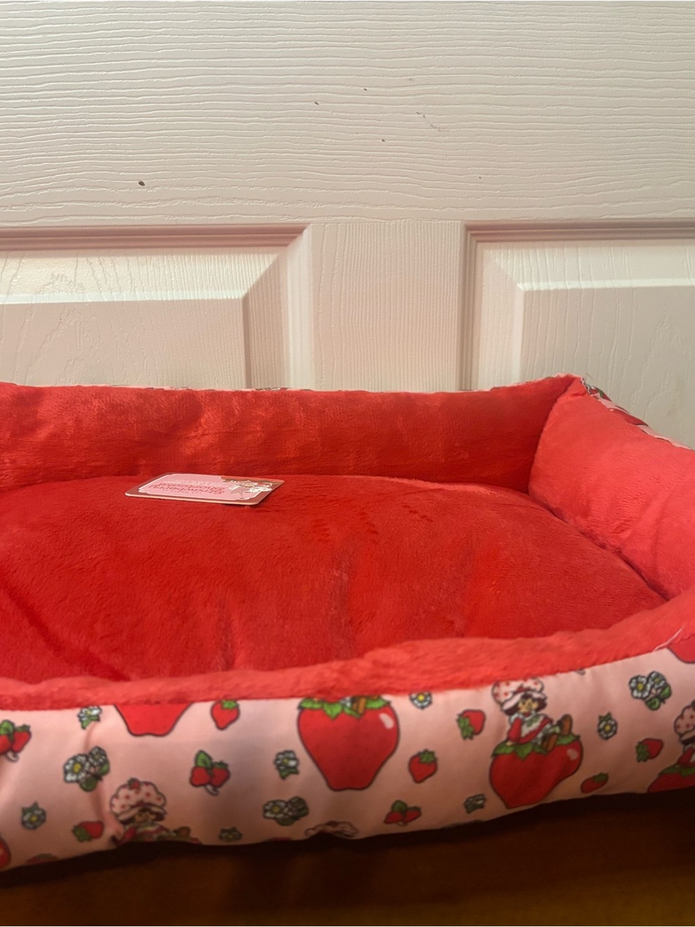 Plush Red Small Pet Bed with Strawberry-Patterned Border